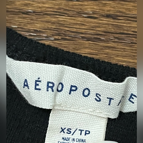 Aeropostale- black tee with buttons and open stomach - Picture 3 of 3